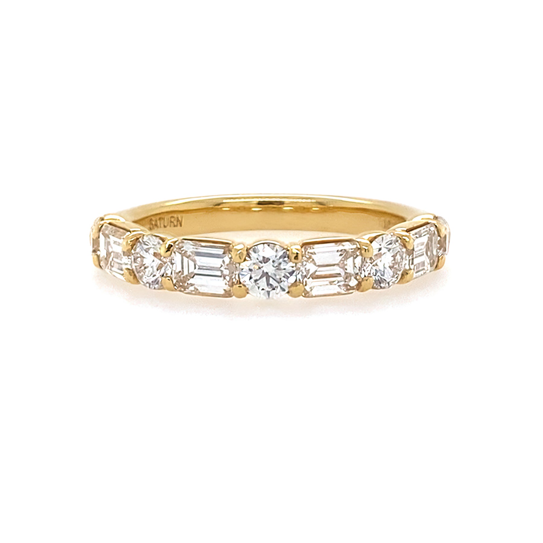 18K Gold ring with diamonds on a white background
