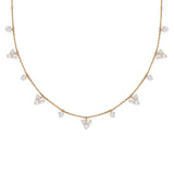 18K Gold necklace with diamond pendants on a white background