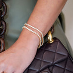 Woman wearing an 8 Carat Diamond Tennis Bracelet offered by Laura Pearce