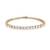 An 18K yellow gold diamond tennis bracelet with a 43  linked round-cut diamonds.
