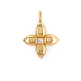 18K Gold flower-shaped pendant with a diamond on a white background