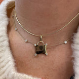 Gumuchian Calendar Charm on model