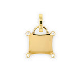 A Gumuchian 18K yellow gold and diamond charm