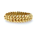 Henry Dunay Gold bracelet on a white background