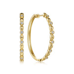Gabriel & Co 18K Gold hoop earrings with diamond accents on a white background