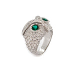 18K White Gold Owl ring with emeralds on a white background