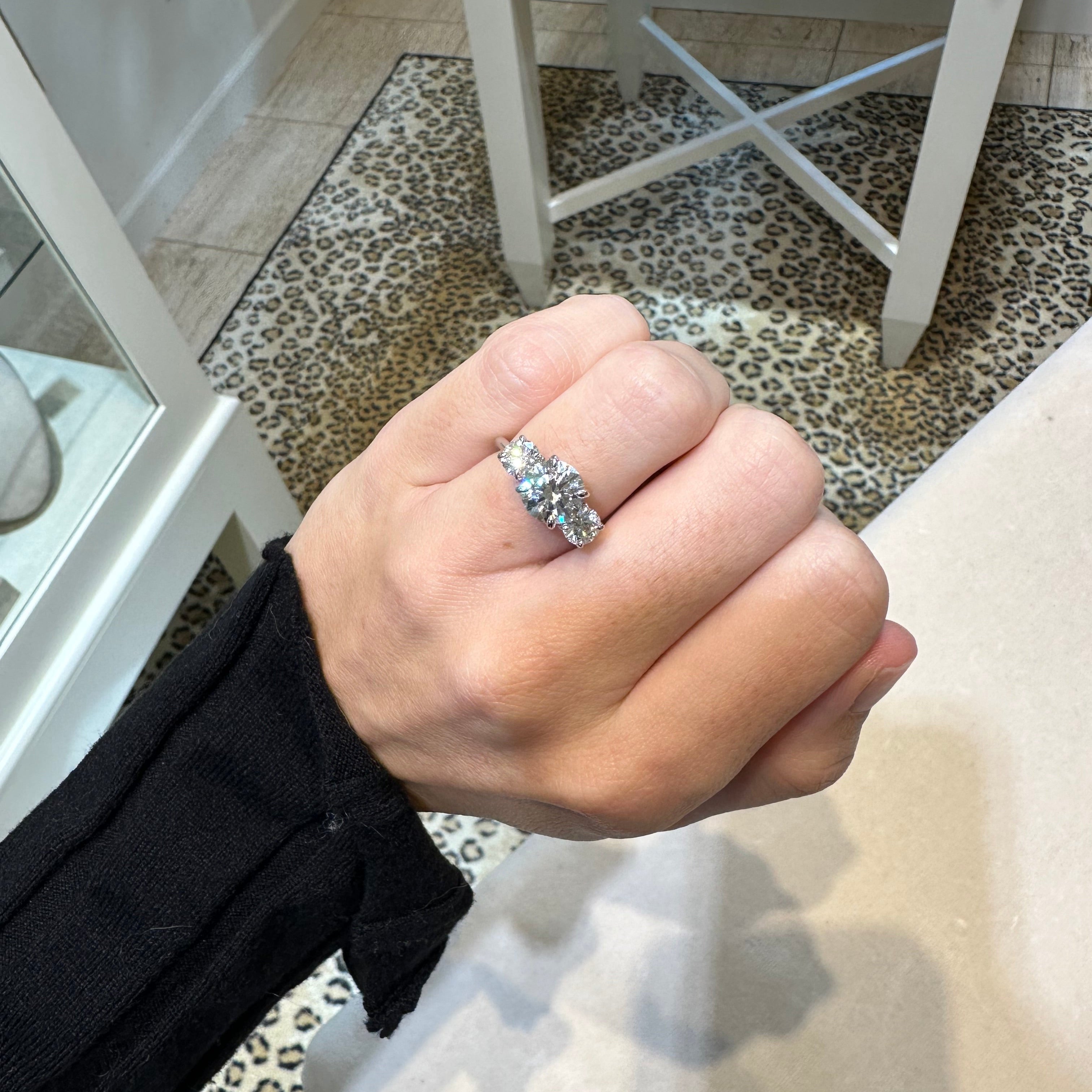 18k white gold 3 stone round cut diamond ring