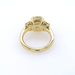 Back View 18k yellow gold bezel set emerald cut engagement ring with trapezoids side stones 