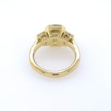 Back View 18k yellow gold bezel set emerald cut engagement ring with trapezoids side stones 