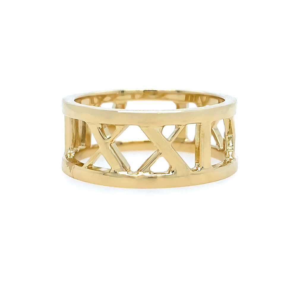 An 18K yellow gold openwork ring with a geometric lattice design, shown on a plain white background.