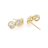 Custom designed 18K Gold earrings with bezel set diamonds