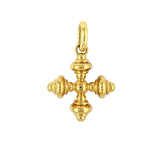 Estate 18K Gold cross pendant on a white background