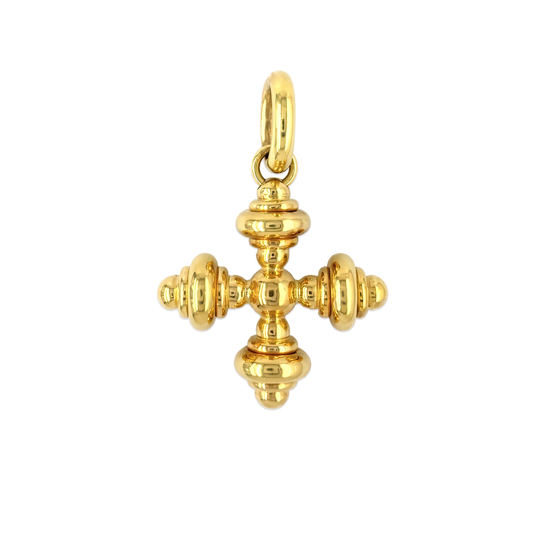 Estate 18K Gold cross pendant on a white background