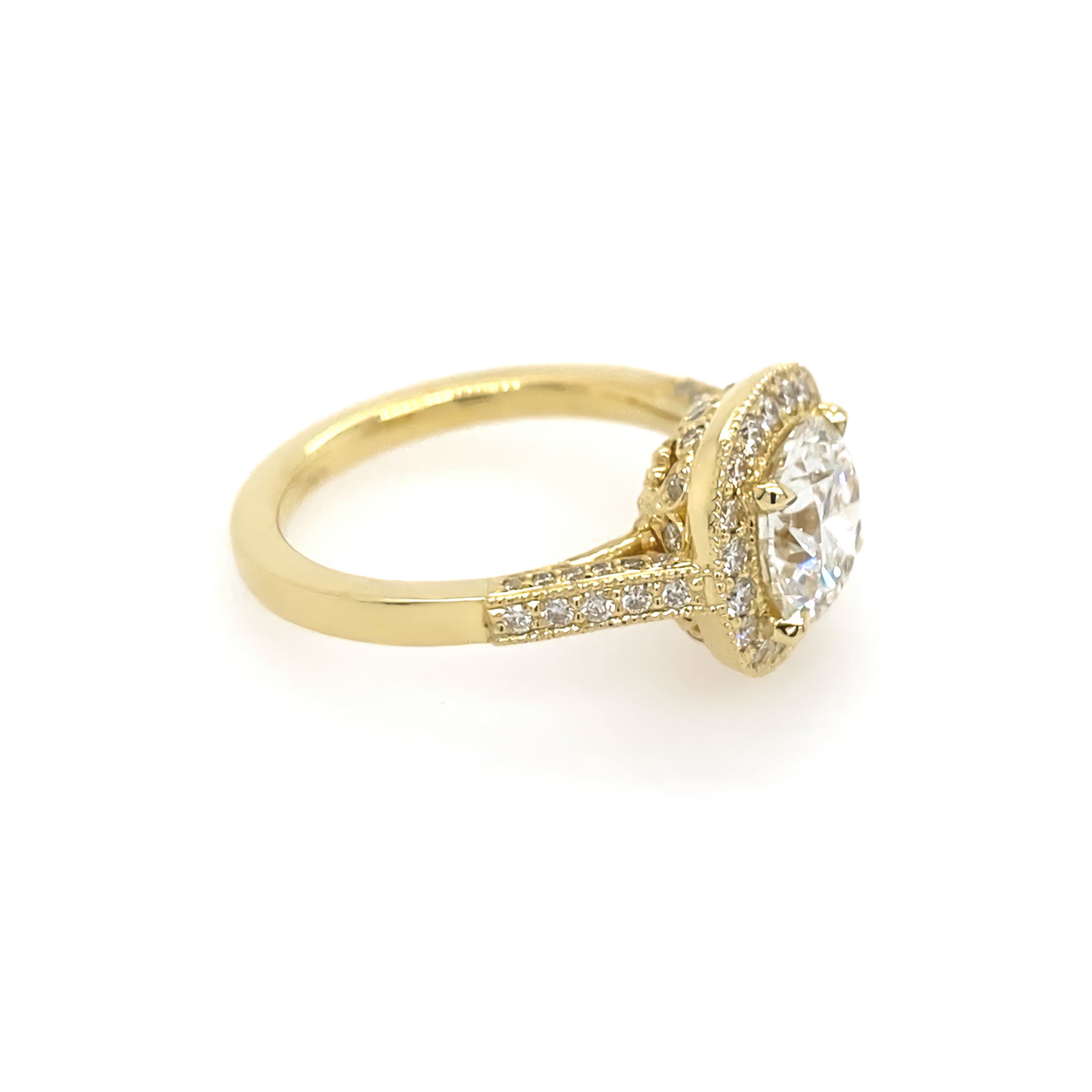 Custom 18K yellow gold diamond engagement ring designed by Laura Pearce 