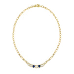 Gold chain necklace with bezel set diamonds and sapphires 