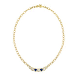 Gold chain necklace with bezel set diamonds and sapphires 