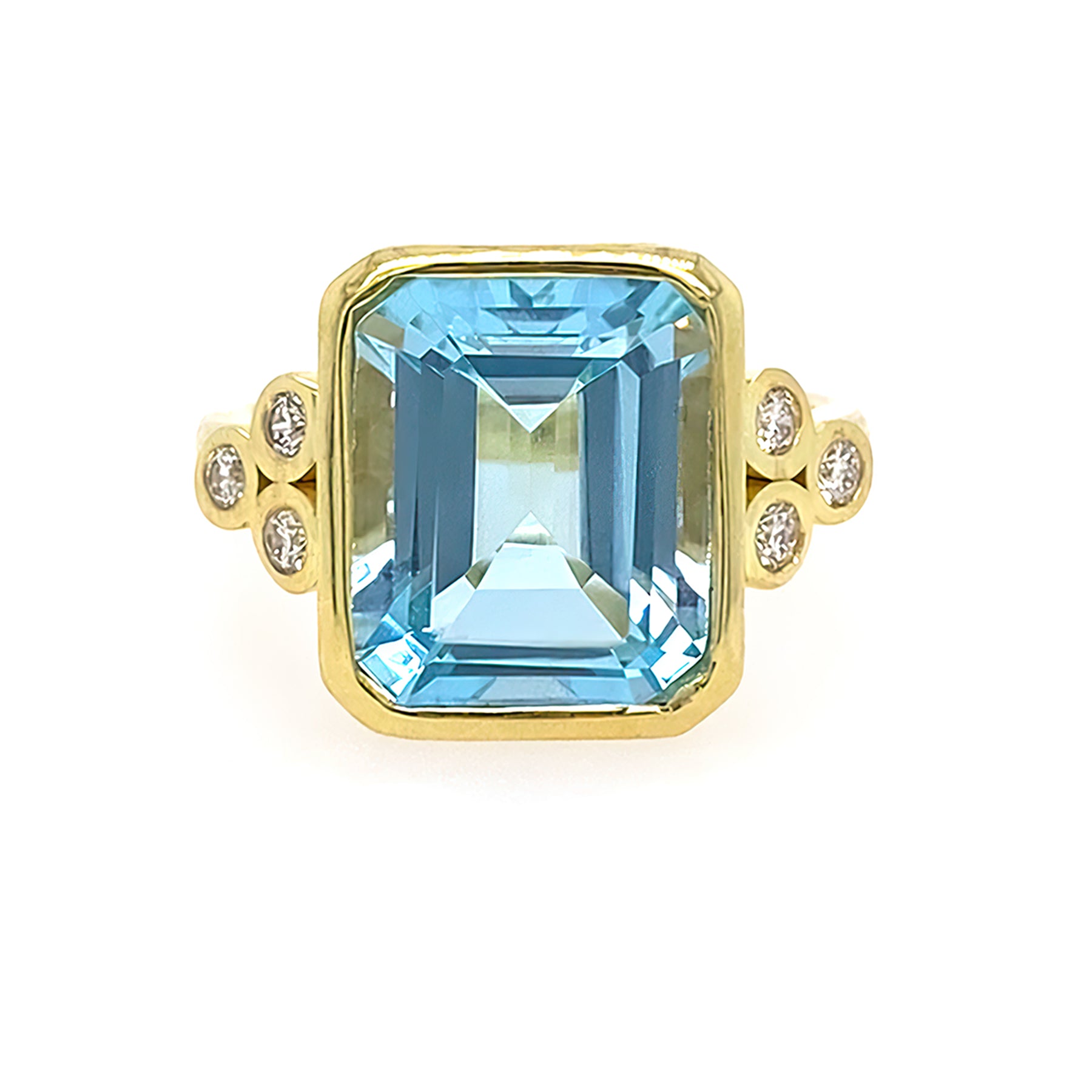 Gold ring with a large blue gemstone and smaller diamonds on a white background
