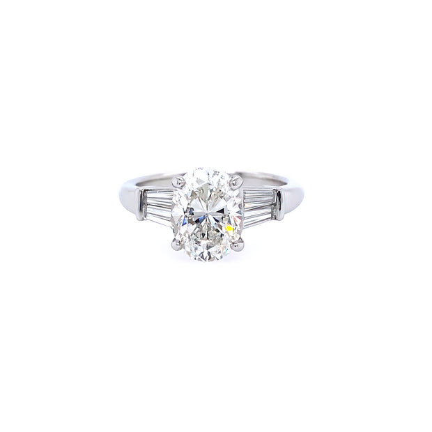 Platinum Oval Cut Center Stone with Tapered Baguettes