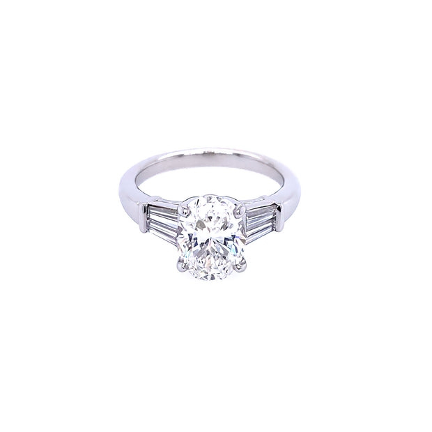 Platinum Oval Cut Center Stone with Tapered Baguettes