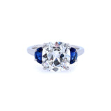 Platinum and cushion diamond ring  with  half moon sapphire sides