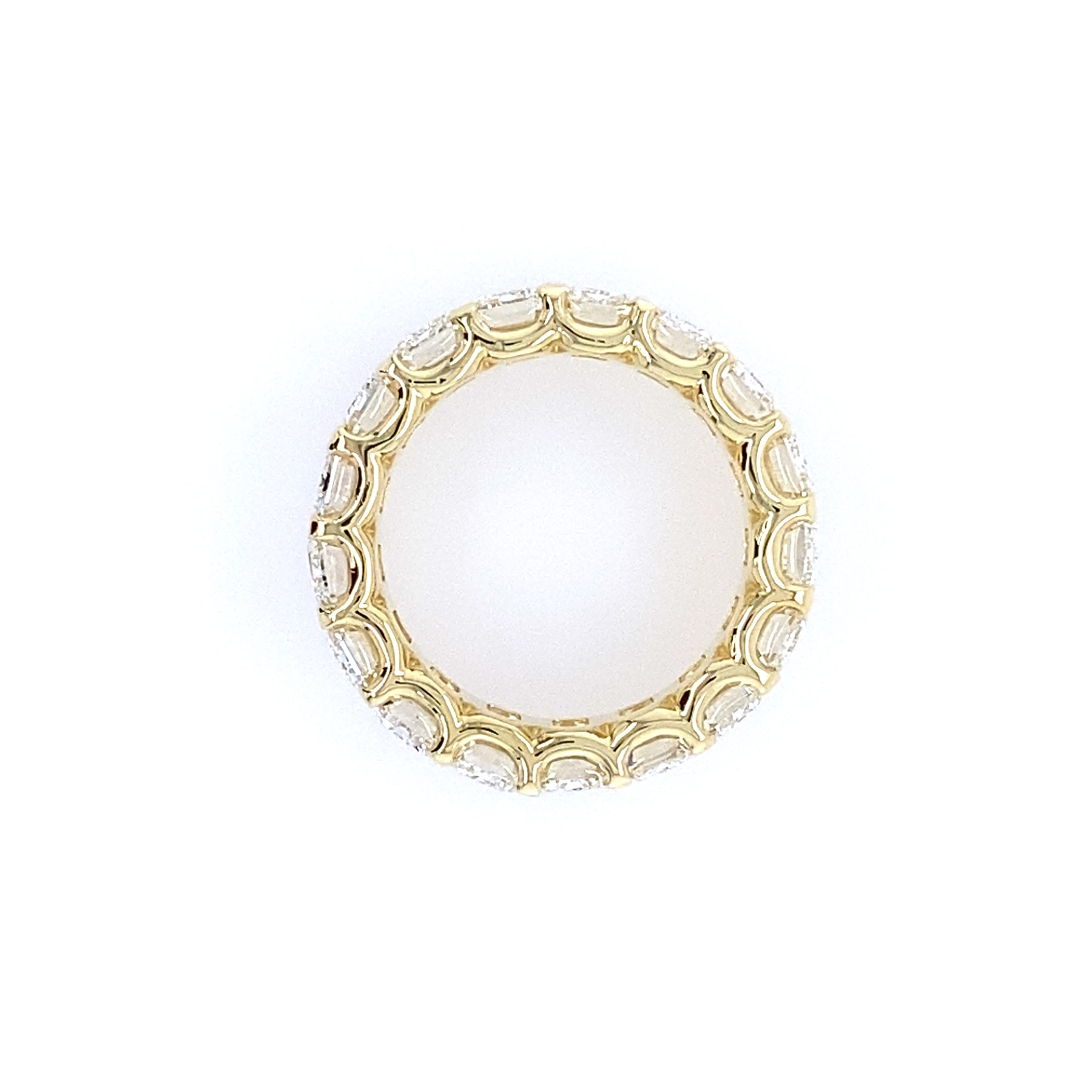 profile view of 18k yg eternity band with emerald-cut diamonds 