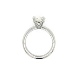 A platinum solitaire engagement ring with a round brilliant-cut diamond set in a four-prong setting, shown against a plain white background.