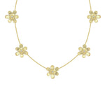 An 18K yellow gold flower necklace featuring five textured flower charms with small clear diamond centers, displayed on a clean white background.