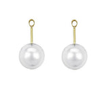 A pair of earring jackets featuring large, round white freshwater pearls suspended from slim 18K yellow gold posts with circular loops at the top, set against a plain white background.