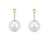 A pair of earring jackets featuring large, round white freshwater pearls suspended from slim 18K yellow gold posts with circular loops at the top, set against a plain white background.