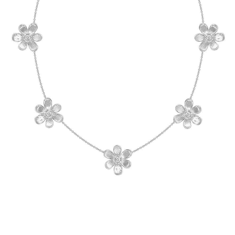 An 18K white gold floral necklace featuring five textured flower charms spaced along a delicate chain, set against a plain white background.