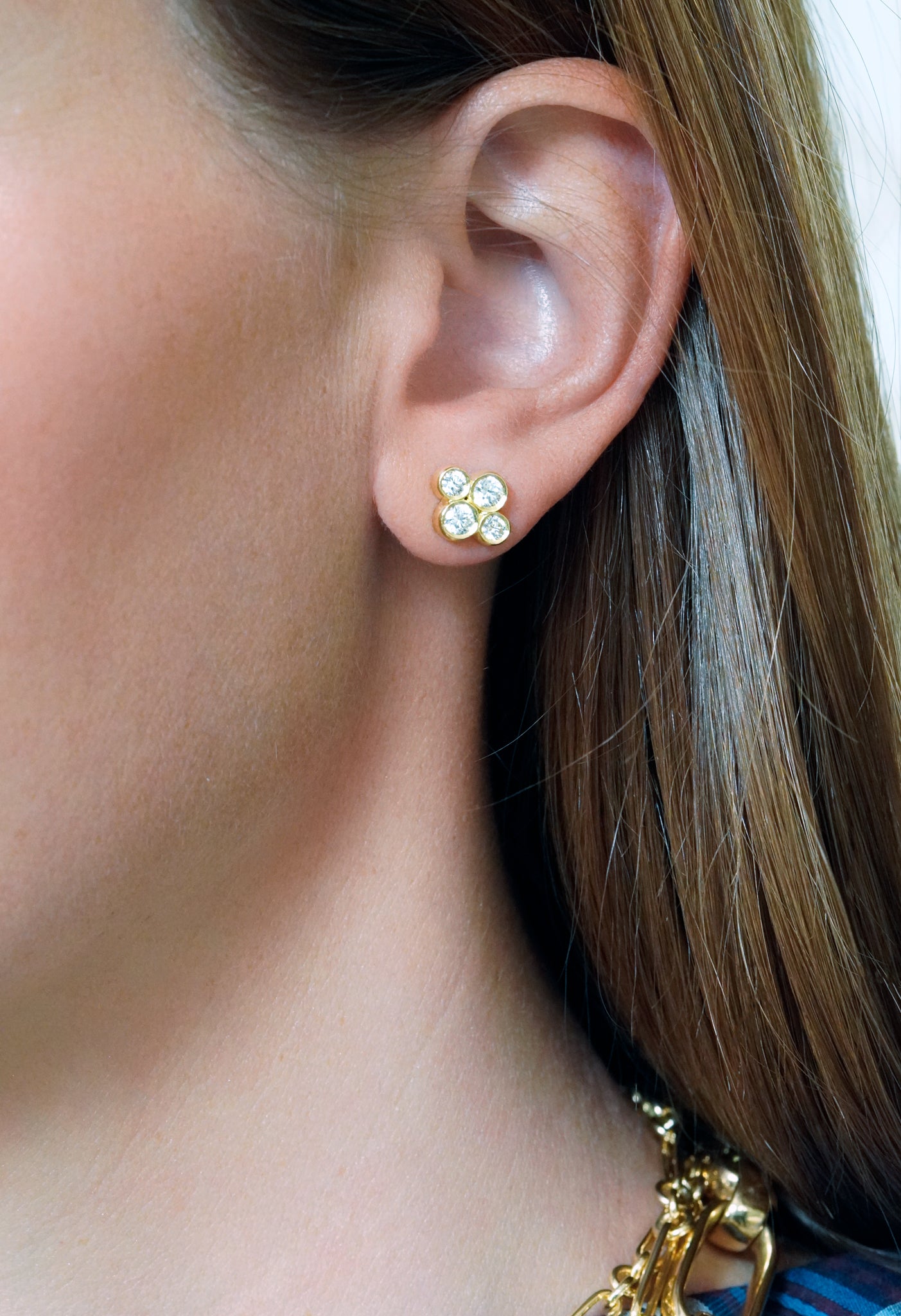 Woman wearing LPL Signature Collection 18 Karat Yellow Gold and Diamond "Anderson" Earrings