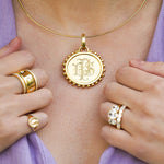 18K Gold necklace with a pendant on model