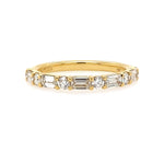 18K Gold ring with diamond stones on a white background