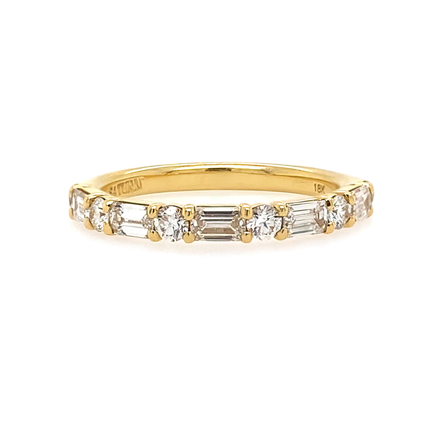 18K Gold ring with diamond stones on a white background