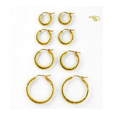 Four Sets of gold hoop earrings on a white background