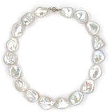 Baroque Pearl necklace with white gold clasp on a white background