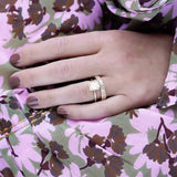 Woman's hand with a 18K gold rings