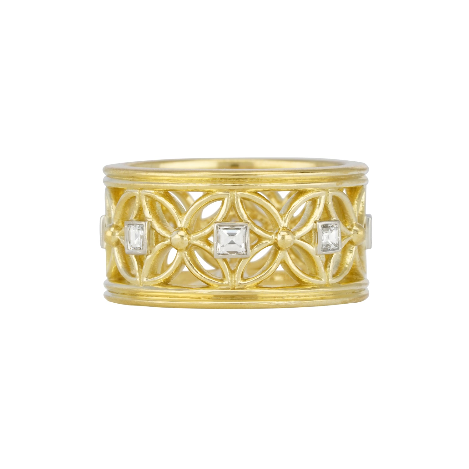 An 18kt yellow gold ring with inset diamonds in a geometric pattern