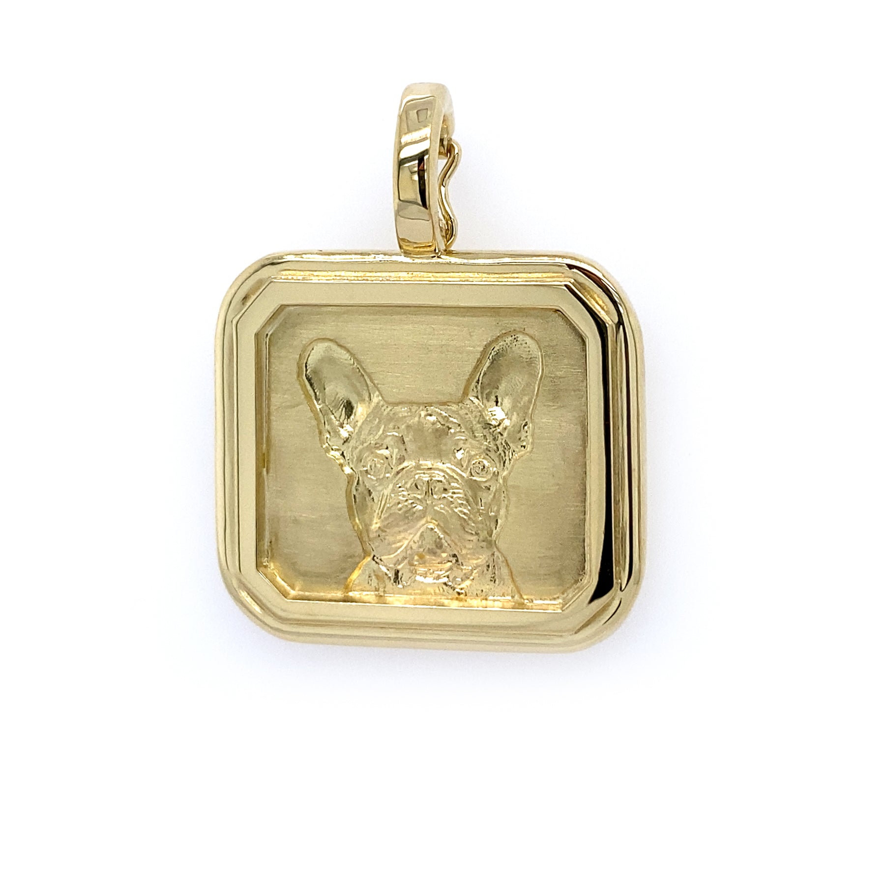 An 18K yellow gold pendant featuring a square frame and an image of a French Bulldog inside.
