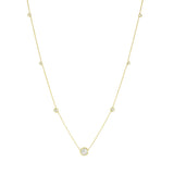 A custom designed 18kt yellow gold necklace with a series of round diamonds strung on a chain.