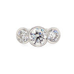 Platinum bezel set Three-stone diamond ring 