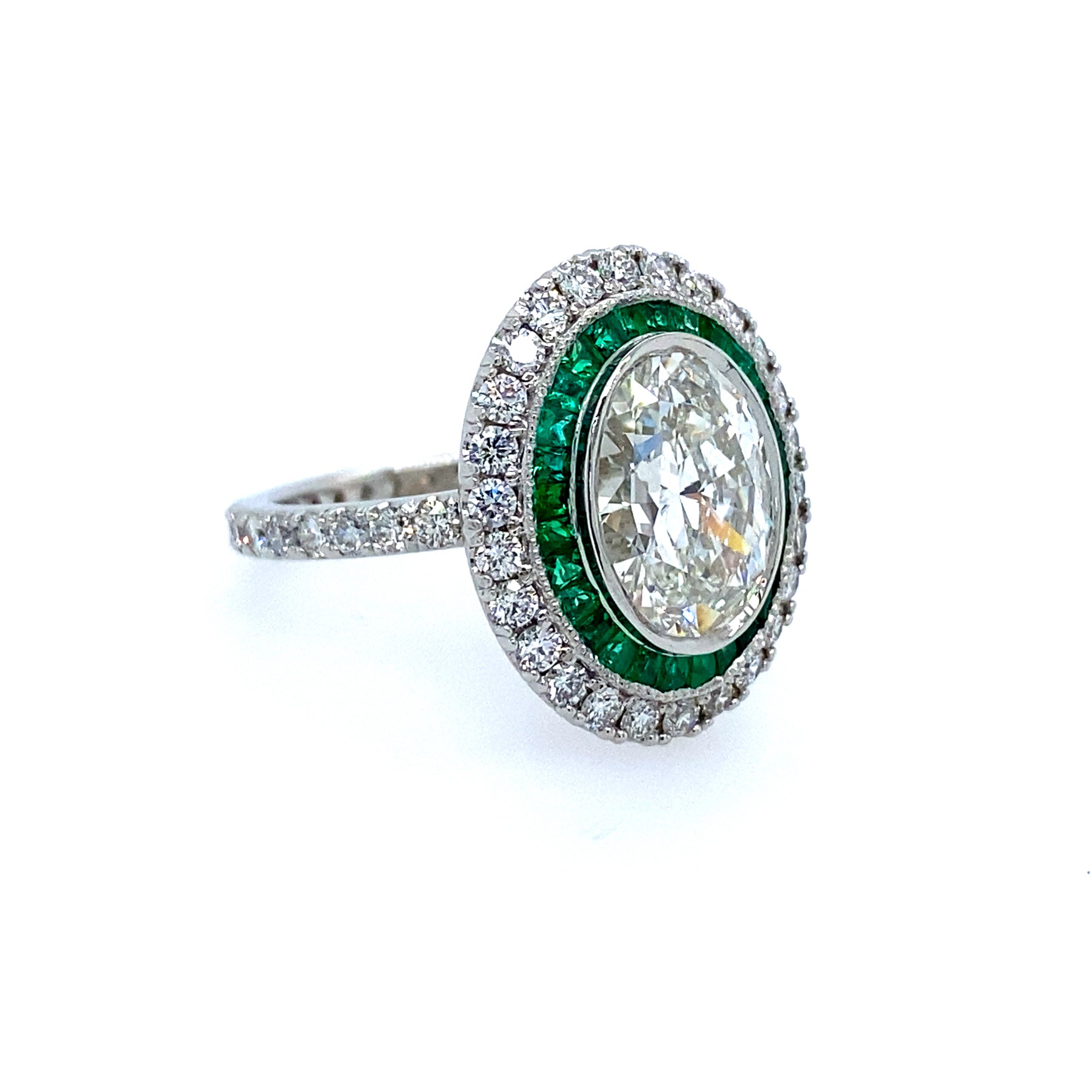 Platinum Diamond and Emerald Ring