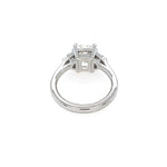 Diamond ring with a white gemstone on a white background