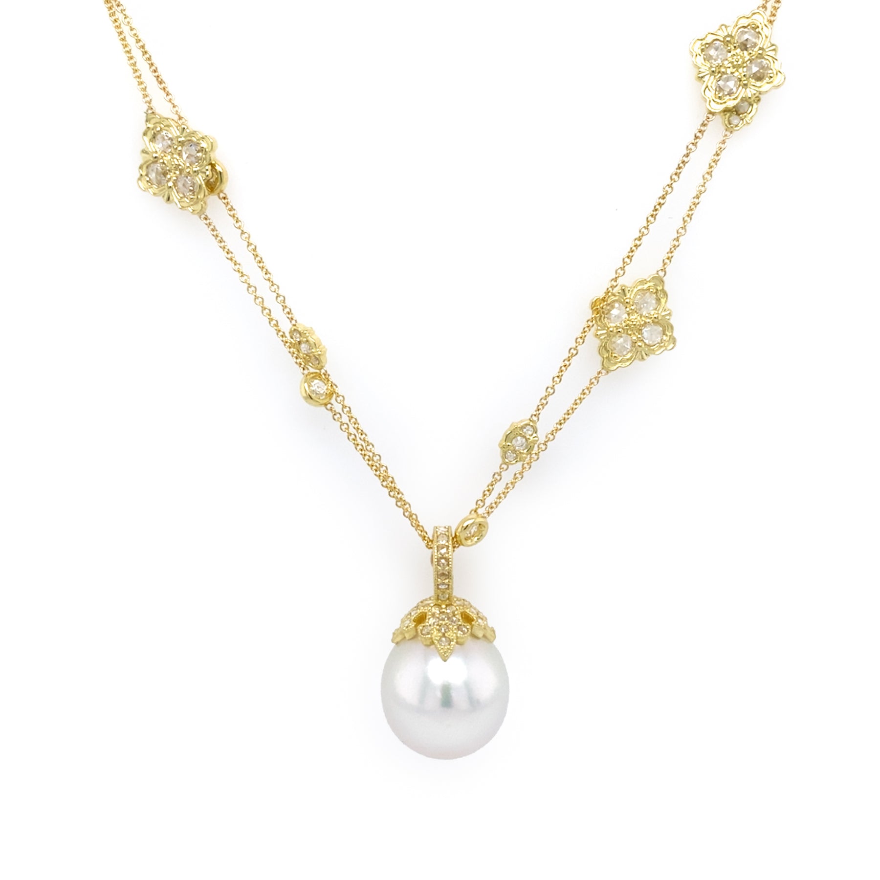 Gold necklace with a pearl pendant on a white background