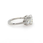sideview of three stone diamond cushion cut ring