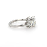 sideview of three stone diamond cushion cut ring