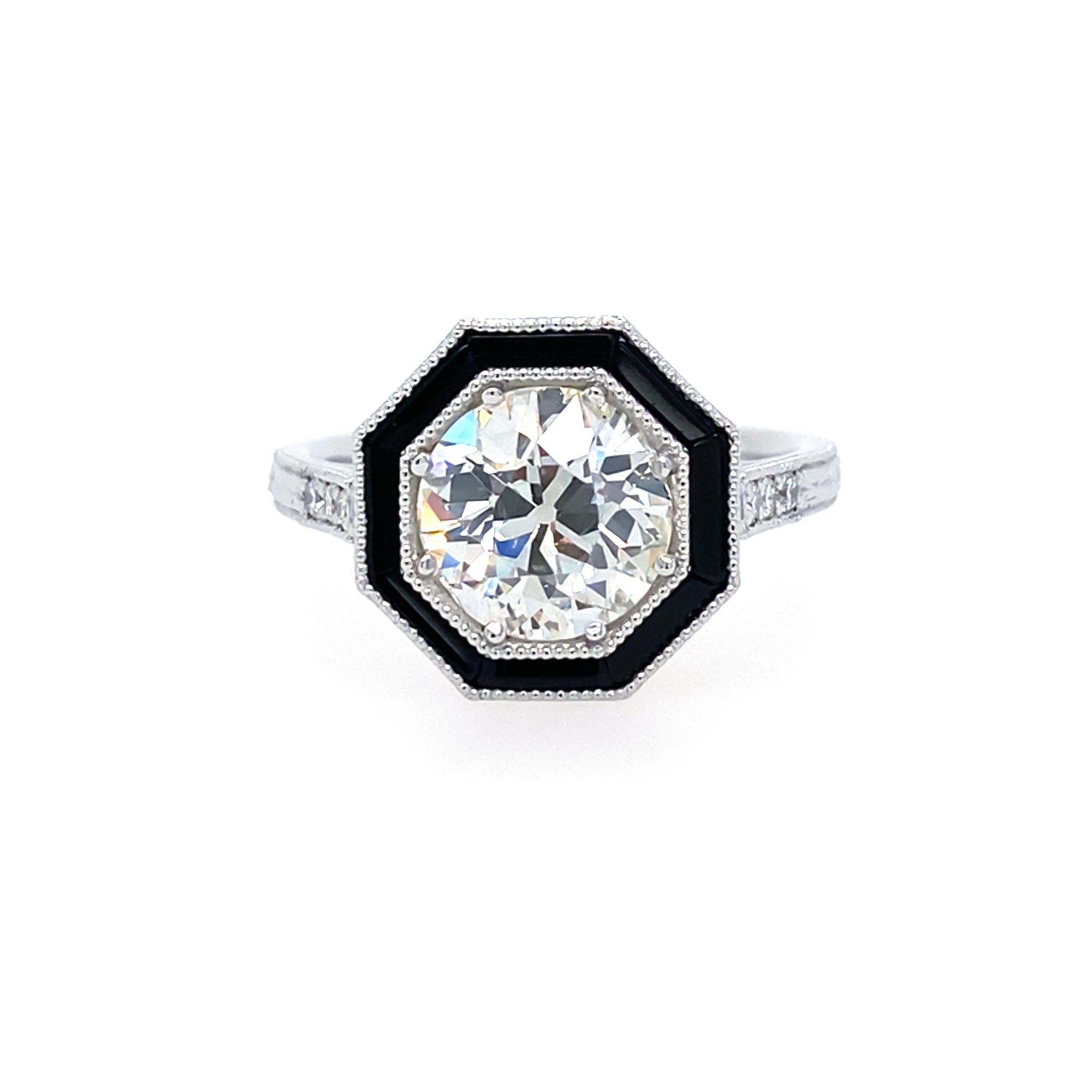 Platinum and Diamonds Engagement ring with Onyx detail