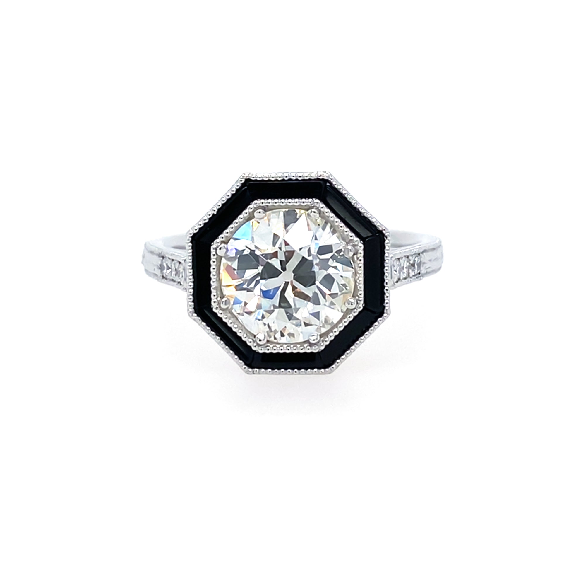 Platinum and Diamonds Engagement ring with Onyx detail