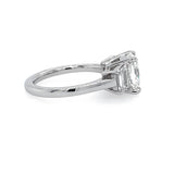 Custom designed Cushion Cut Diamond Ring with Trapezoid Diamond Side Stones in Platinum