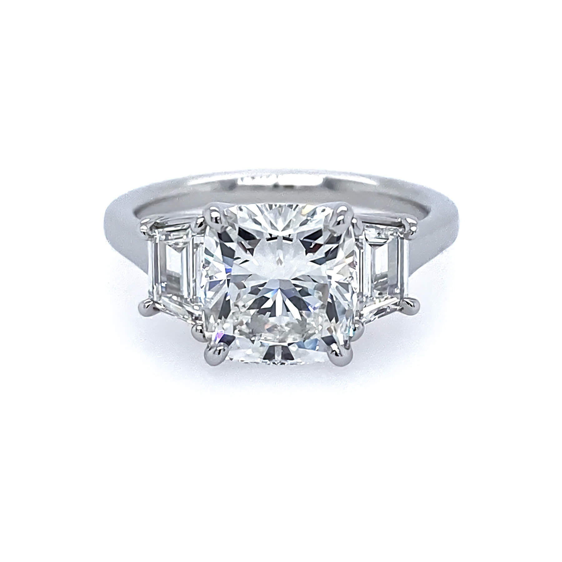Custom designed Cushion Cut Diamond Ring with Trapezoid Diamond Side Stones in Platinum